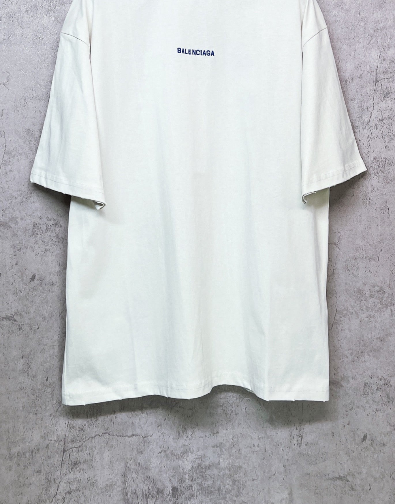 White T-shirt with BALENCIAGA chest logo, short sleeves, crew neck.