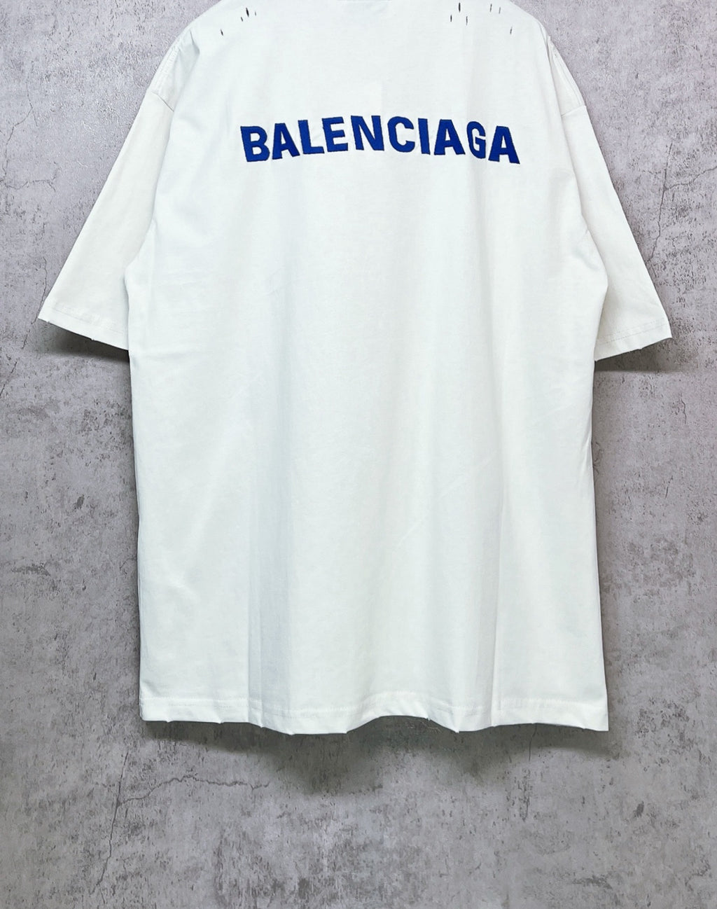 White short-sleeve T-shirt with BALENCIAGA back logo, crew neck.