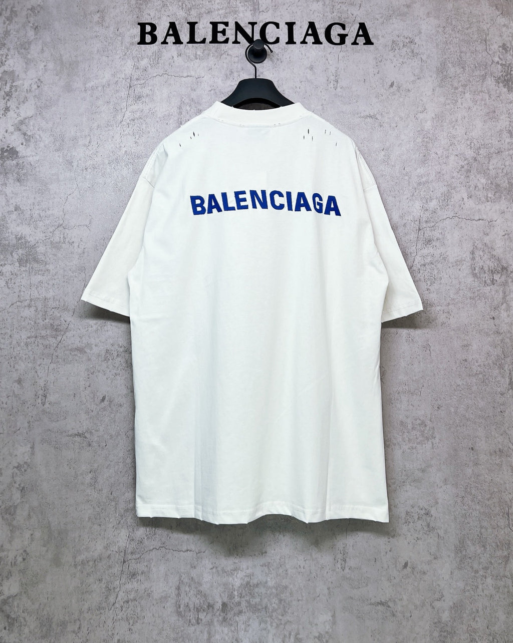 White short-sleeve T-shirt with BALENCIAGA back logo, crew neck.