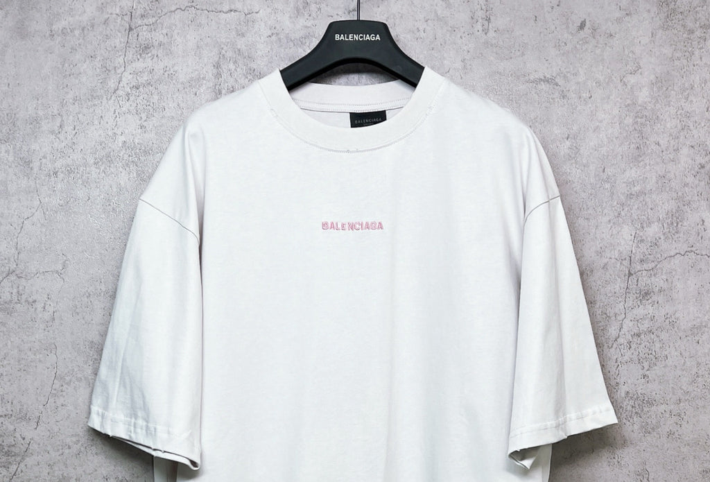 White short-sleeve crewneck T-shirt with small center chest logo