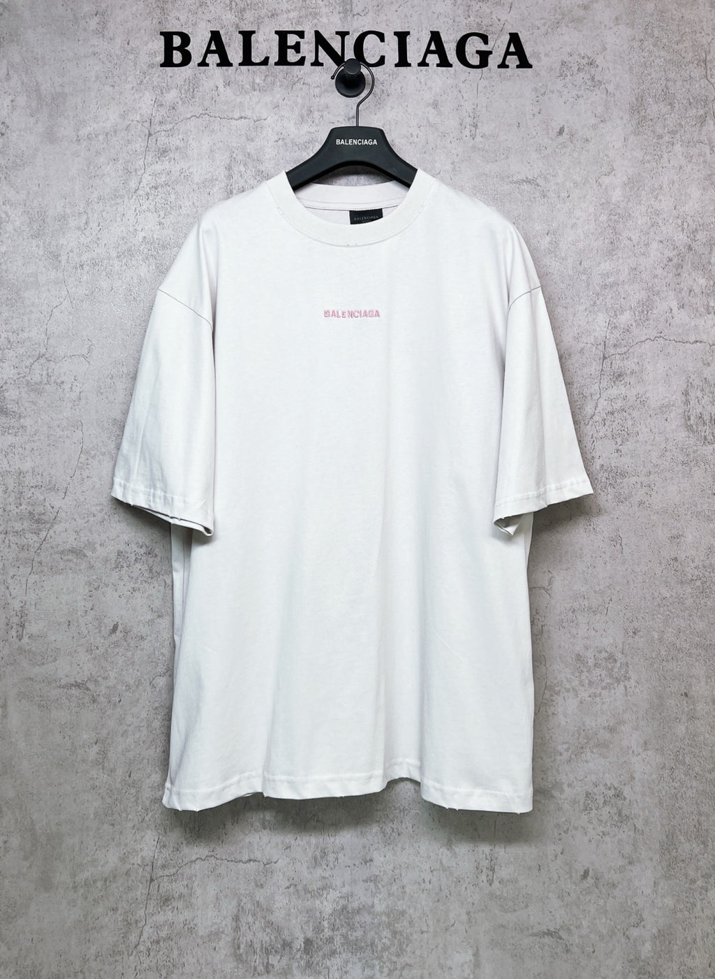 White short-sleeve crewneck T-shirt with small chest logo print
