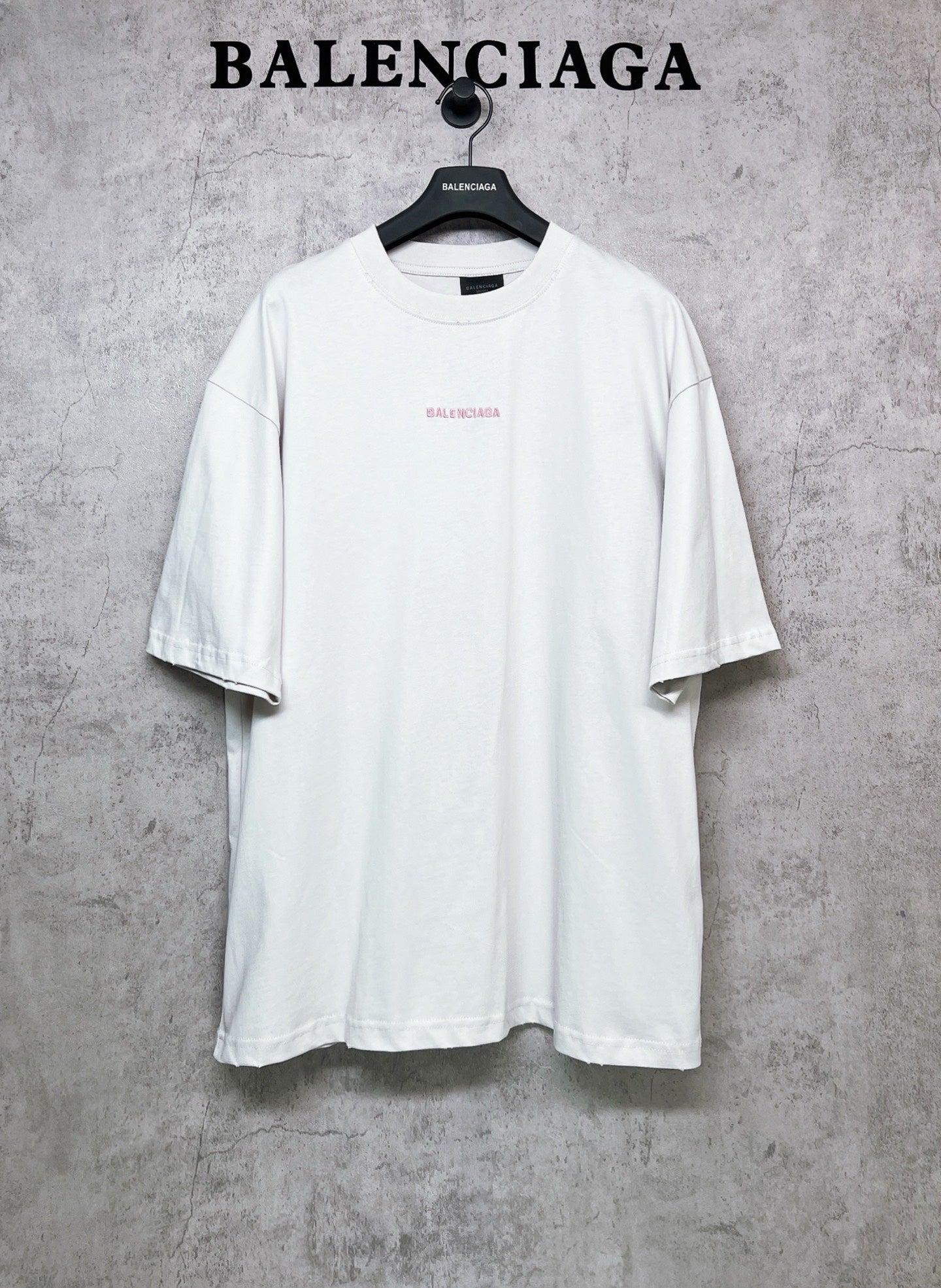 White short-sleeve crewneck T-shirt with small chest logo print