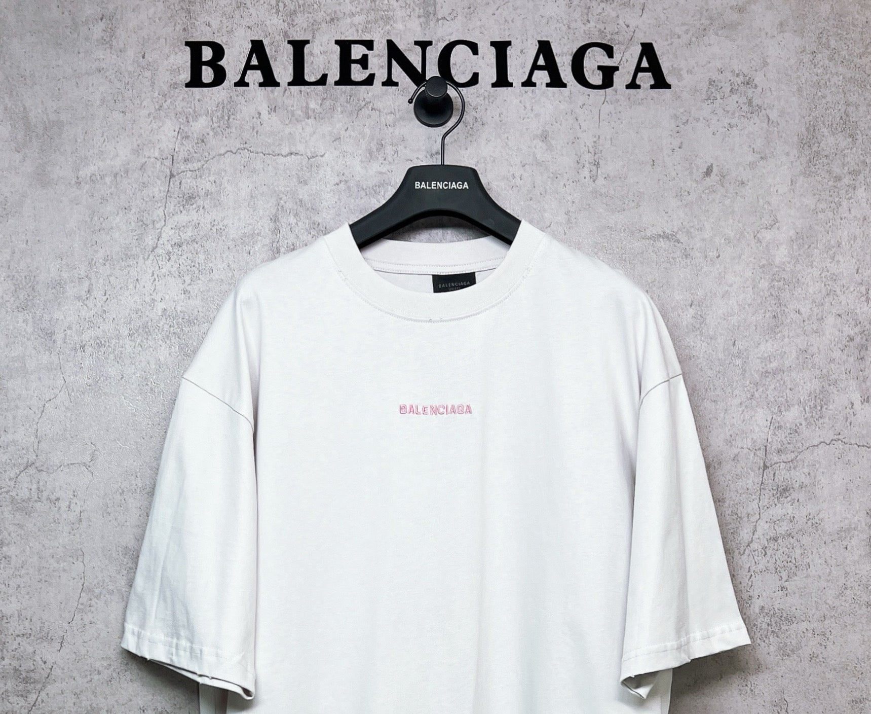 White short-sleeve crewneck T-shirt with small chest logo print