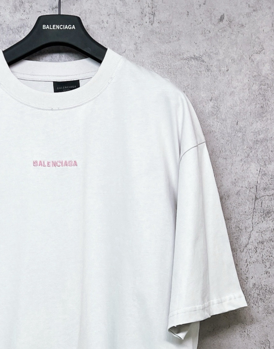 White short-sleeve crewneck T-shirt with small chest logo and crew neckline