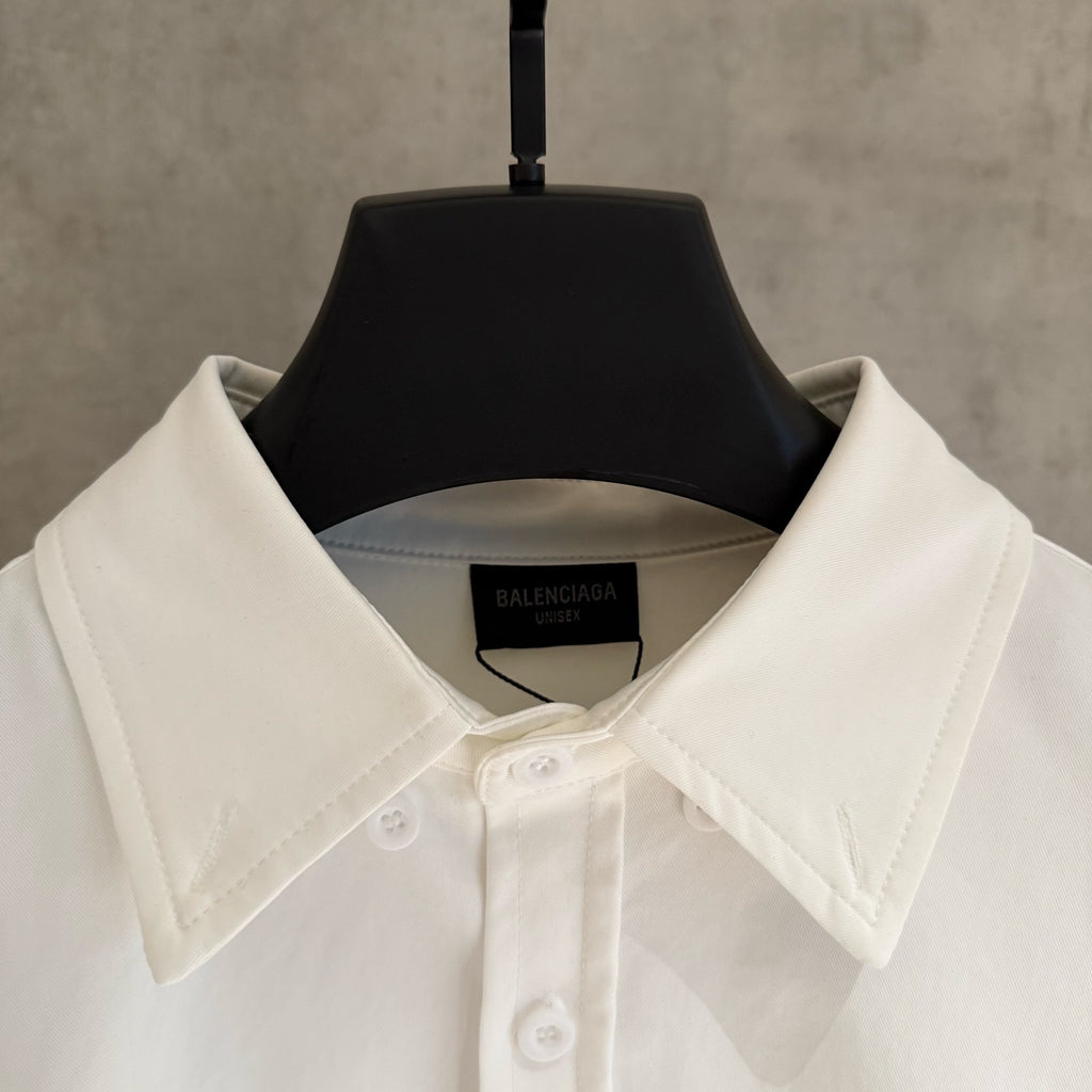 White shirt collar with button placket and Balenciaga neck label
