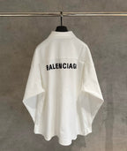 White long-sleeve shirt with BALENCIAGA text on back