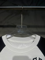 White raglan long-sleeve T-shirt collar with small circular logo at neckline