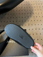 Balenciaga slide sandal outsole close-up with textured tread and logo