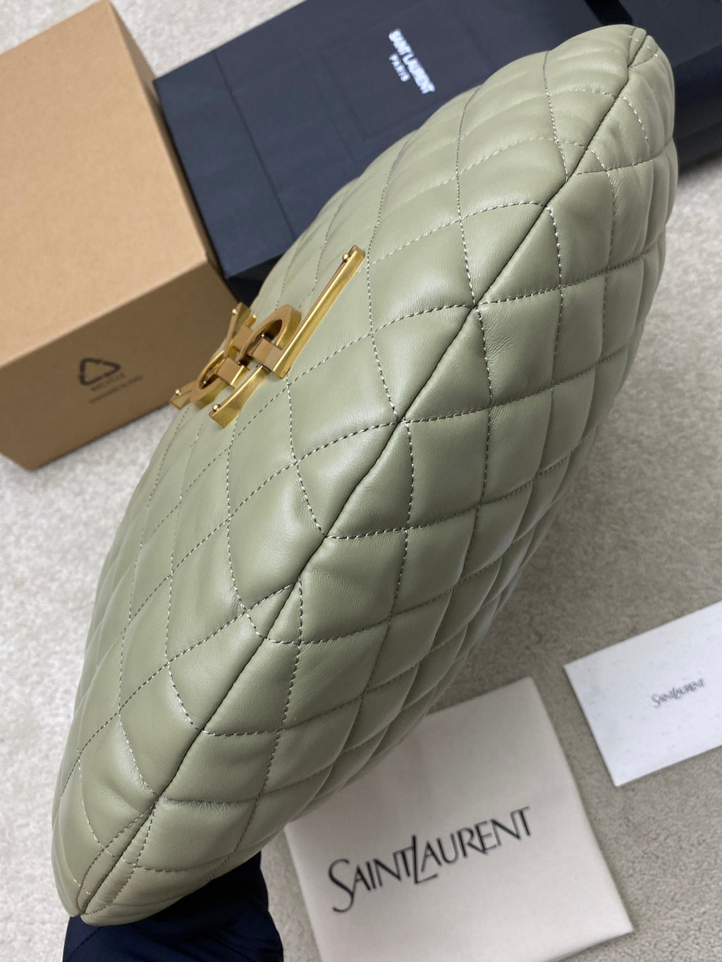 Sage green quilted hobo bag with gold YSL clasp hardware