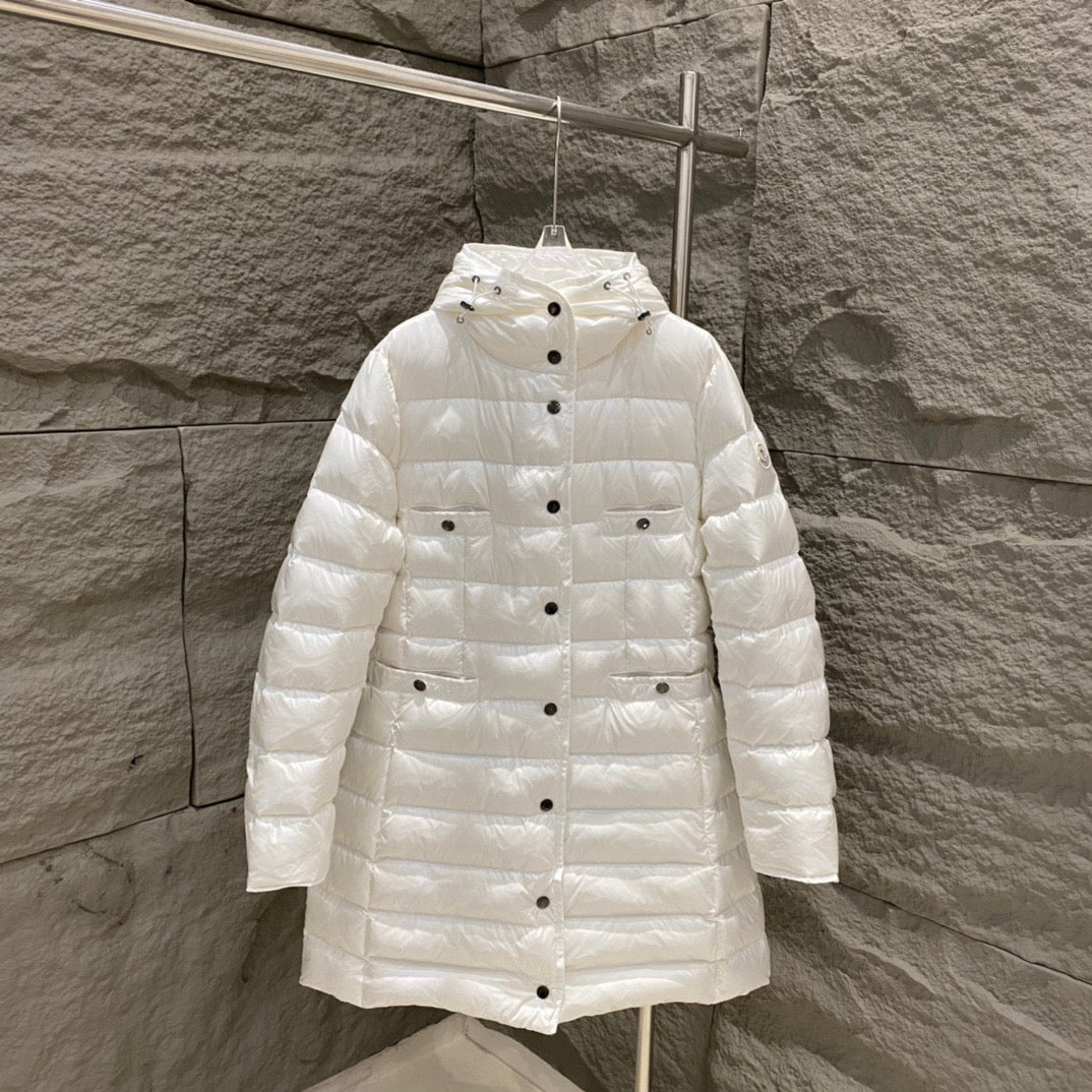 White hooded long puffer coat with quilted panels and button front