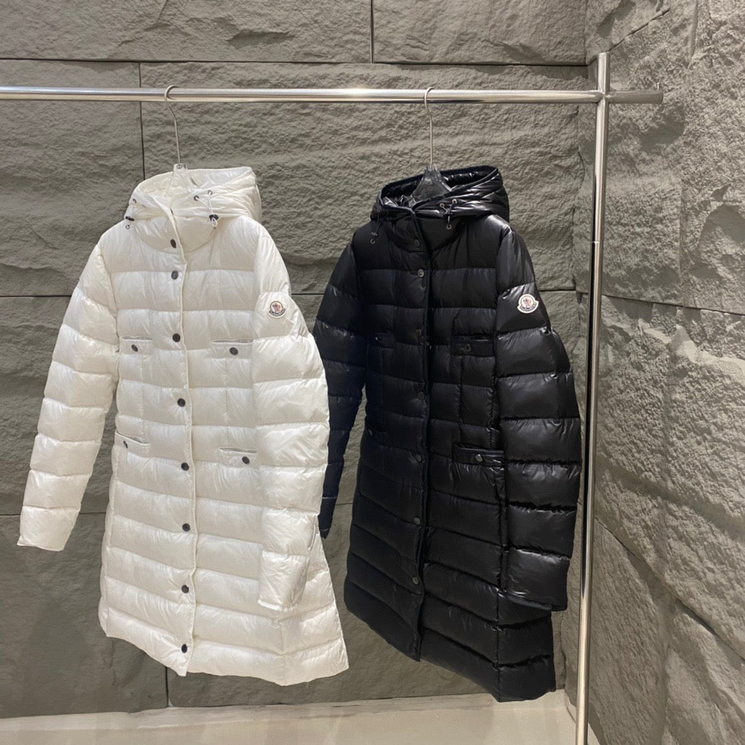 Hooded long puffer coat in black, quilted with button front