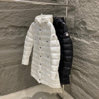 Hooded long puffer coats in white and black, button front on hangers