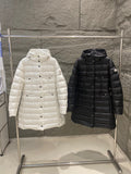 Long puffer coat in white and black, hooded with button front