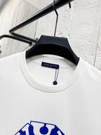 White T-shirt collar with Louis Vuitton tag on black hanger