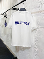 White T-shirt back with blue 'VUITTON' text logo