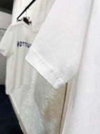 White T-shirt sleeve and side seam detail