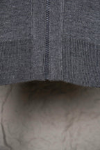 Gray Dior hoodie hem with central zipper seam and ribbed knit edge