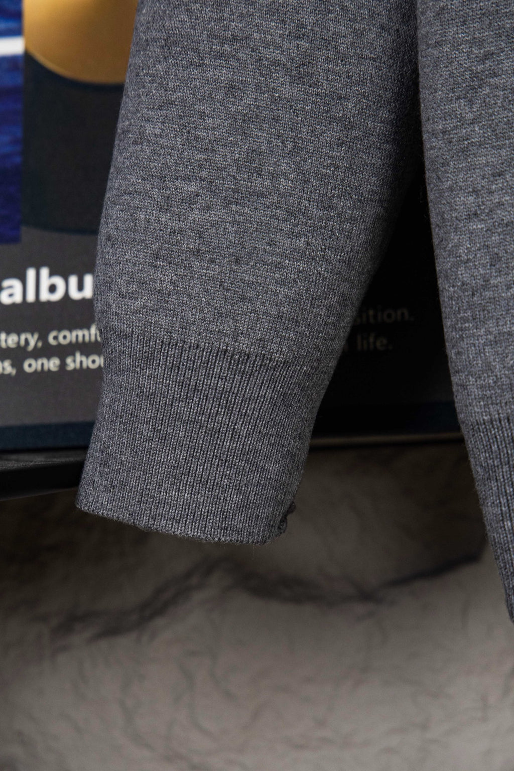 Gray Dior hoodie sleeve hem with ribbed knit cuff and knit texture