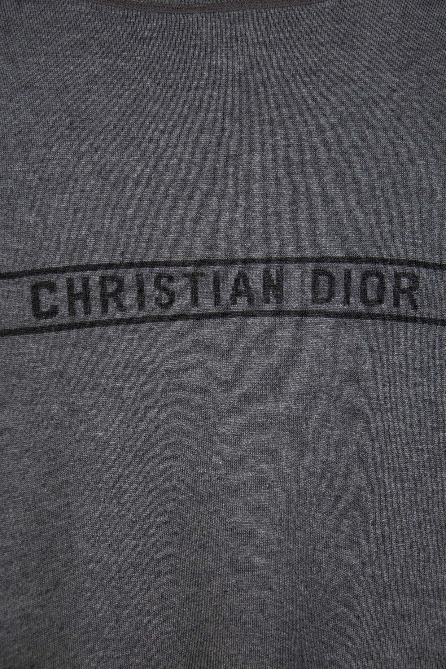 Gray Dior logo band reading “CHRISTIAN DIOR” across the chest