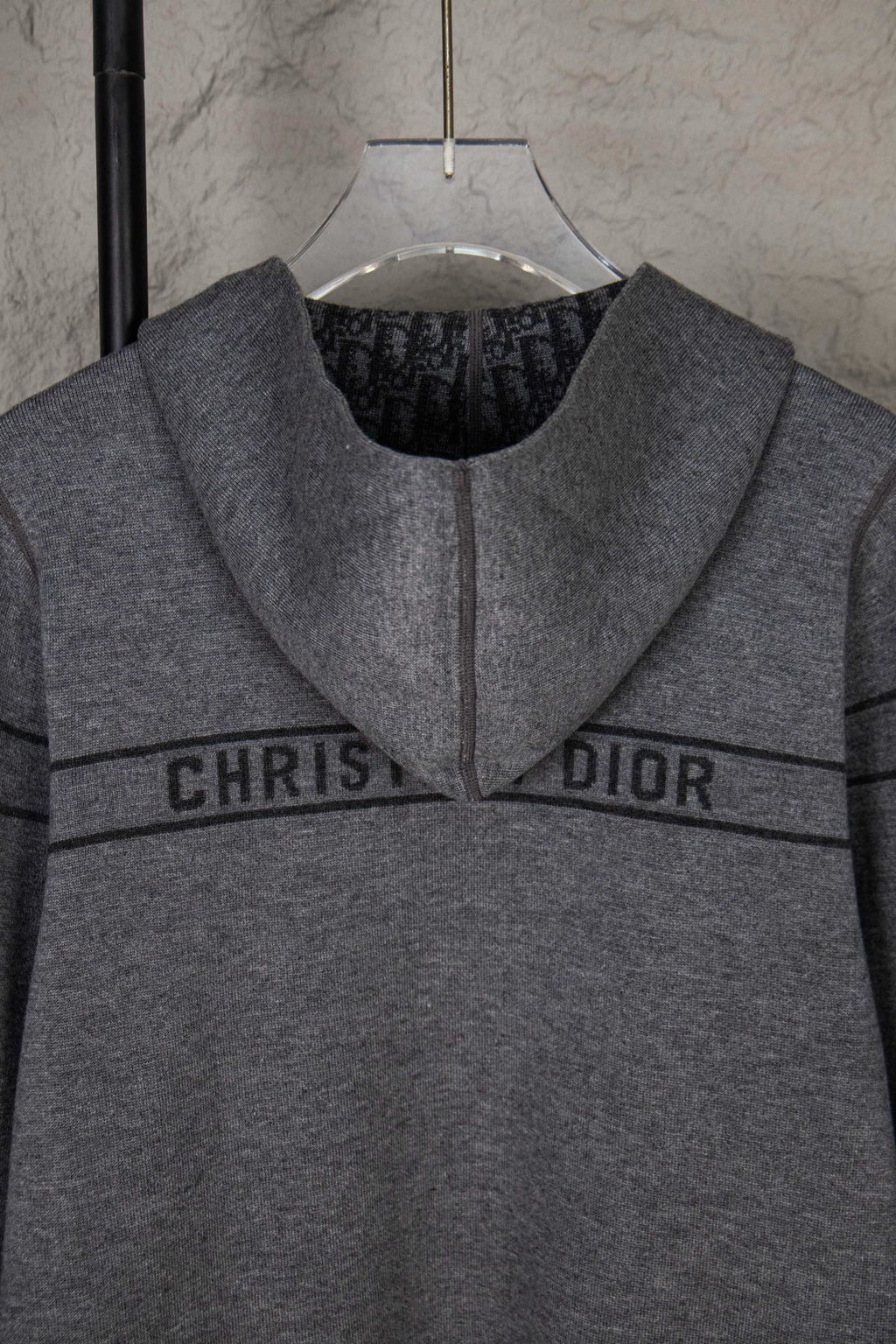 Gray Dior hooded sweatshirt with front logo stripe reading “CHRISTIAN DIOR”