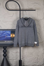 Gray Dior hooded sweatshirt with front zip and “CHRISTIAN DIOR” logo band