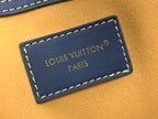 Blue leather patch with Louis Vuitton Paris text and yellow-edge stitching
