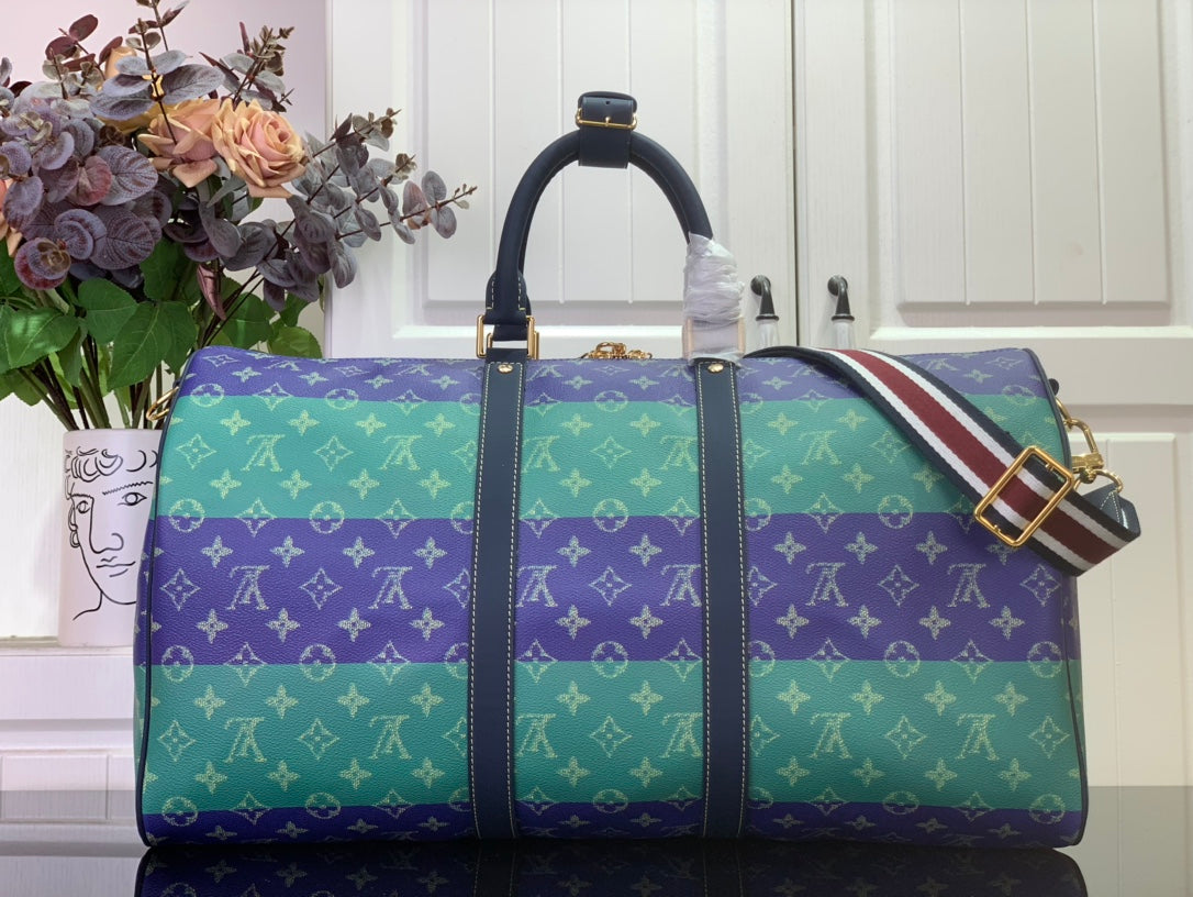 Multicolor duffel bag with top handle and detachable crossbody strap