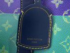 Leather luggage tag with Louis Vuitton Paris text and contrast stitching on bag
