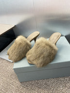 Light beige faux-fur mule sandals with slender stiletto heels, open back