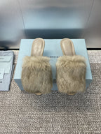 Light beige faux-fur slide sandals with slim stiletto heels, open-back design