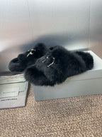 Balenciaga black fur slide sandals with rhinestone bow strap detail