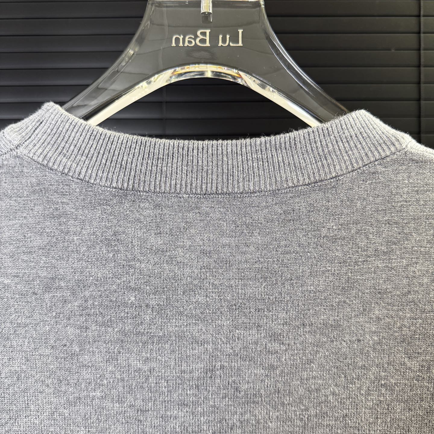 Gray crewneck knit sweater back neckline ribbing