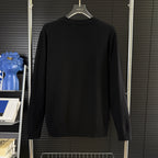 Black Moncler long-sleeve sweater, back view with ribbed crew neckline