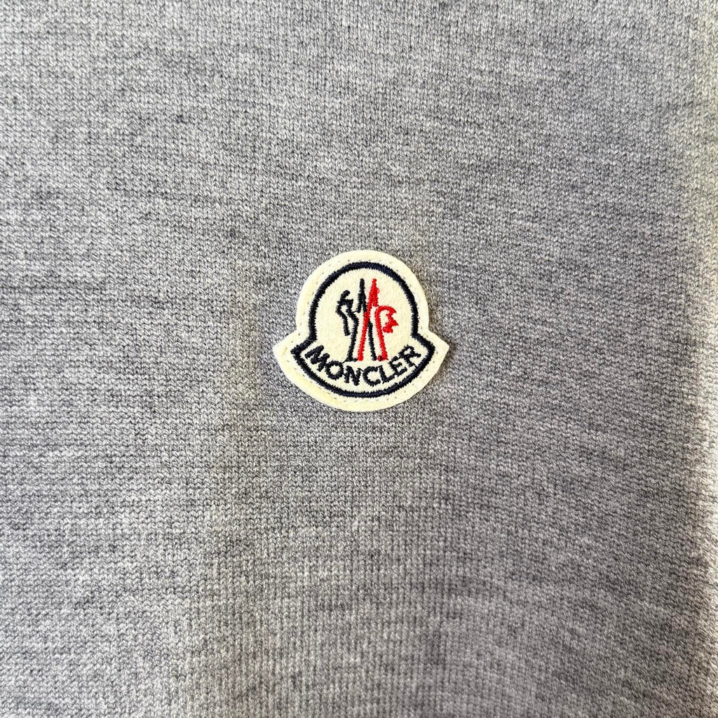 Moncler logo patch on gray knit sweater