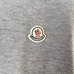 Moncler logo patch on gray knit sweater
