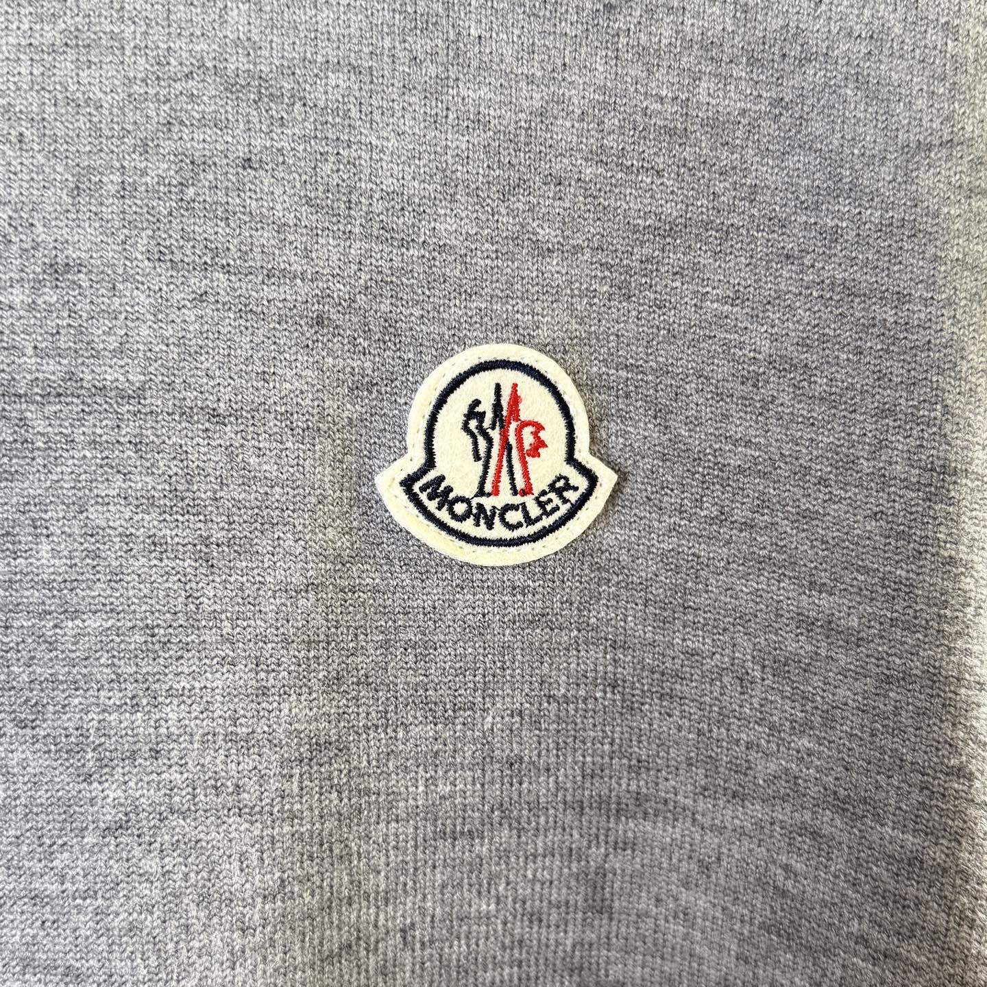 Moncler logo patch on gray knit sweater