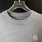Gray crewneck knit sweater collar ribbing