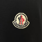 Black Moncler embroidered logo patch on sweater chest