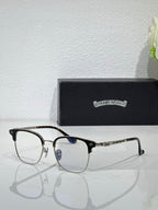 Chrome eyeglasses with black rectangular frames and blue-tinted lenses