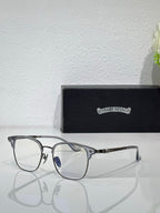 Chrome eyeglasses with dark rectangular frames, clear lenses, and blue temple detail