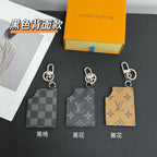 Louis Vuitton keychain set with three monogram charm cards in dark gray and tan