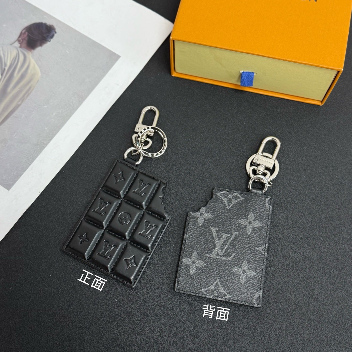 Louis Vuitton keychain charm set with dark monogram front and gray monogram back card