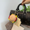Louis Vuitton monogram handbag with round multicolor charm and leather key holder tags