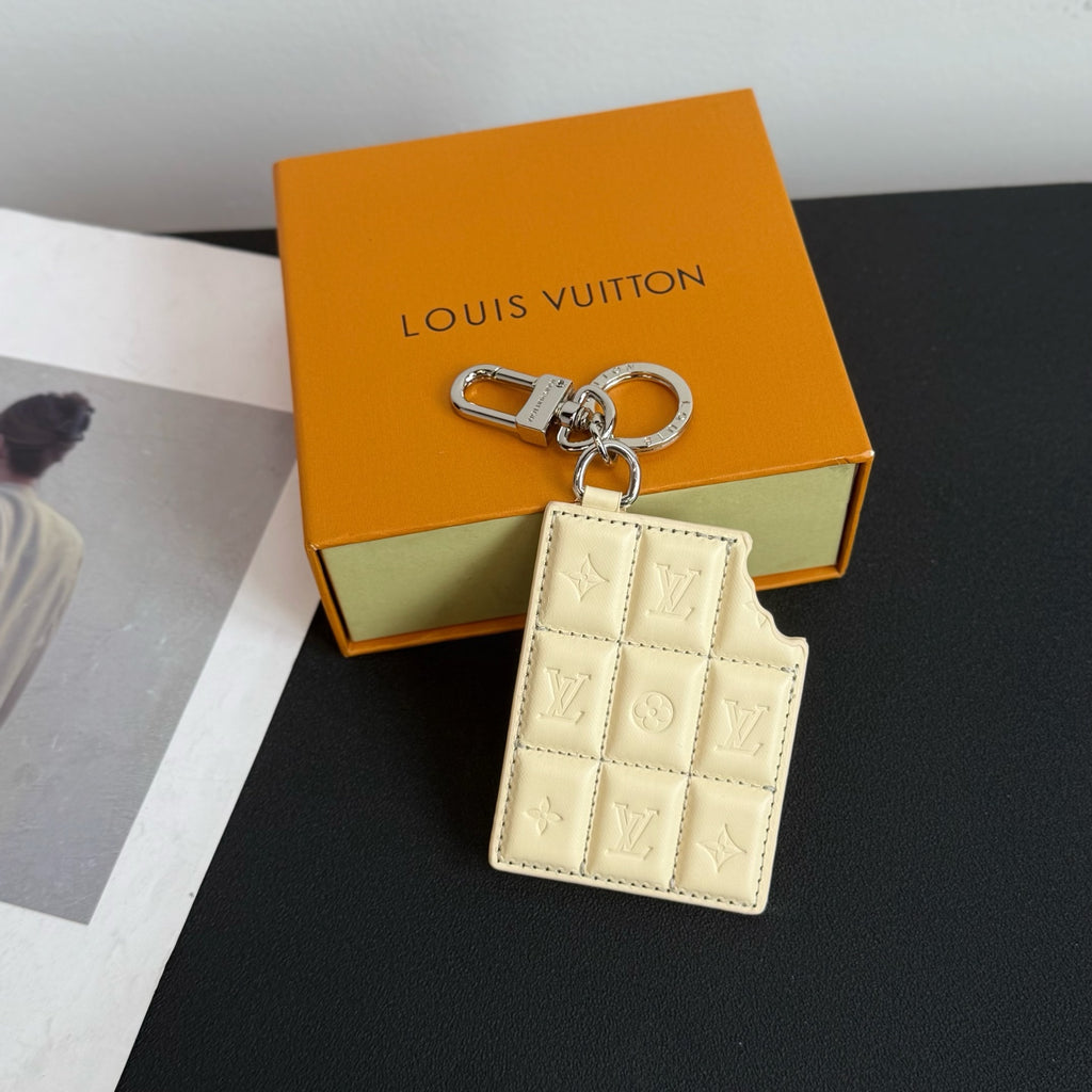 Louis Vuitton keyring card holder with quilted monogram, pale cream leather