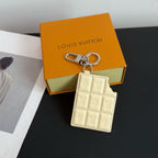 Louis Vuitton keyring card holder with quilted monogram, pale cream leather