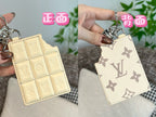 Louis Vuitton cream monogram card holder keychain shown front and back