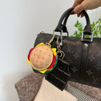 Louis Vuitton monogram handbag with round multicolor charm and hanging leather organizer