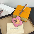 Louis Vuitton keychain: pink flower leather with dog face, logo strap