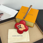 Louis Vuitton keychain: red flower leather with dog face, logo strap