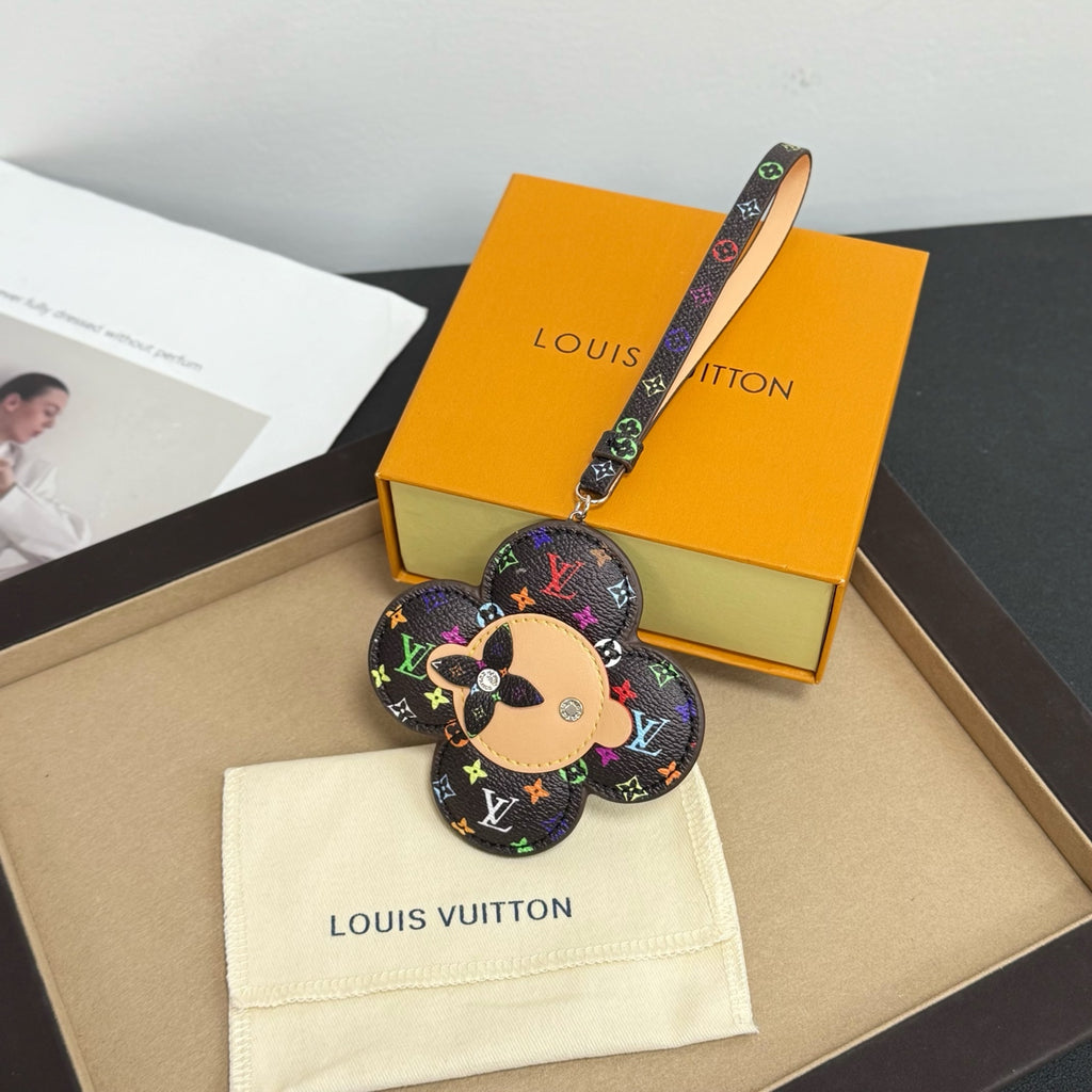 Louis Vuitton keychain: multicolor monogram flower with dog face, logo strap